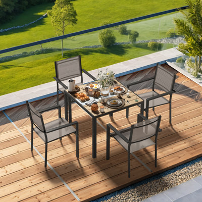 5 Piece Outdoor Patio Dining Set With 1 Square Patio Table & 4 PVC-coated polyester Stackable Chairs, Patio Dining Furniture For 4, Wpc Tabletop And All-weather Resistant Iron Frame, Suitable For Garden, Backyard And Deck, Brown
