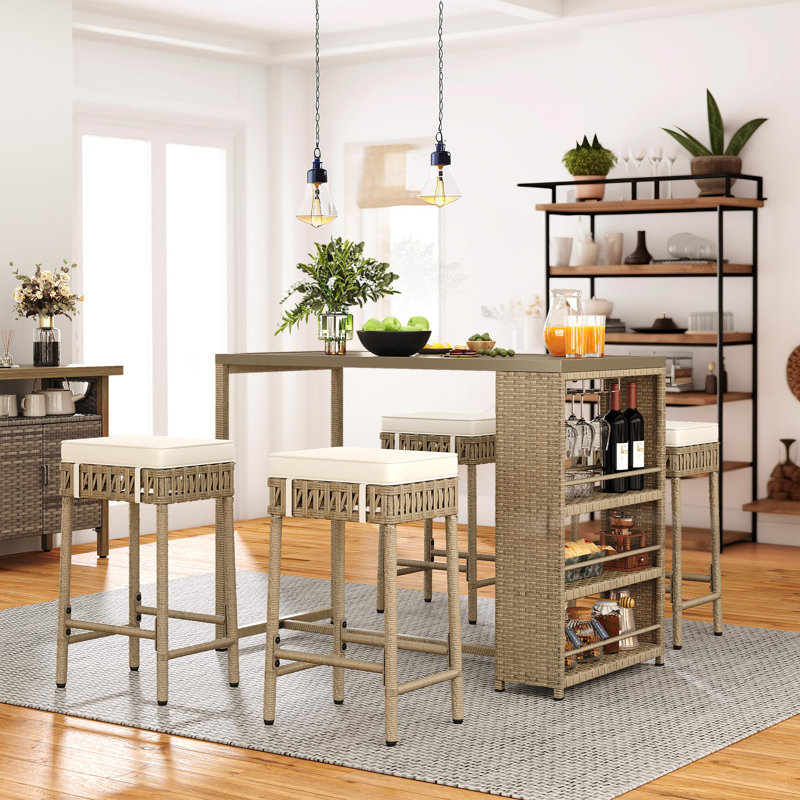 Bragdon 4 - Person Patio Dining Set with Rectangular Table , Cushions Included, Brown Frame/Beige Cushion