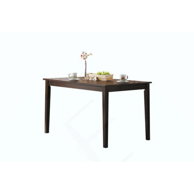 Table de salle à manger avec plateau fixe en bois et pieds fuselés, parfaite pour un repas à la maison élégant et durable.