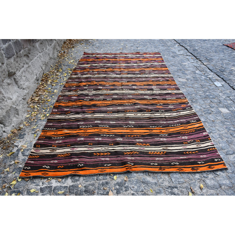Tapis turc rétro à rayures orange et brunes offre une touche bohémienne pour un décor ethnique brun / orange