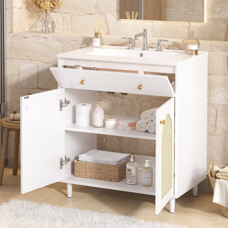 Meuble-lavabo de 76 cm avec lavabo en céramique, structure en bois massif, tablette réglable et panneaux avant pour un rangement moderne et polyvalent.