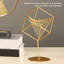 Décoration de table géométrique en or 3D