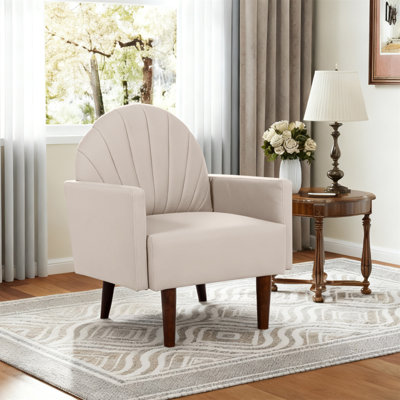 Un fauteuil contemporain en forme de coquille avec un revêtement en cuir de polyuréthane et des pieds en bois, adapté aux salons, aux balcons, aux chambres d'enfants et aux bureaux.