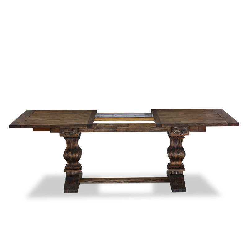 L'ensemble de salle à manger 5 pièces comprend une table en bois et 4 chaises rembourrées en polyester texturé noir, jacobine vieilli