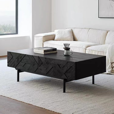 Table basse noire sculptée