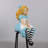 Alice Sitting Statue