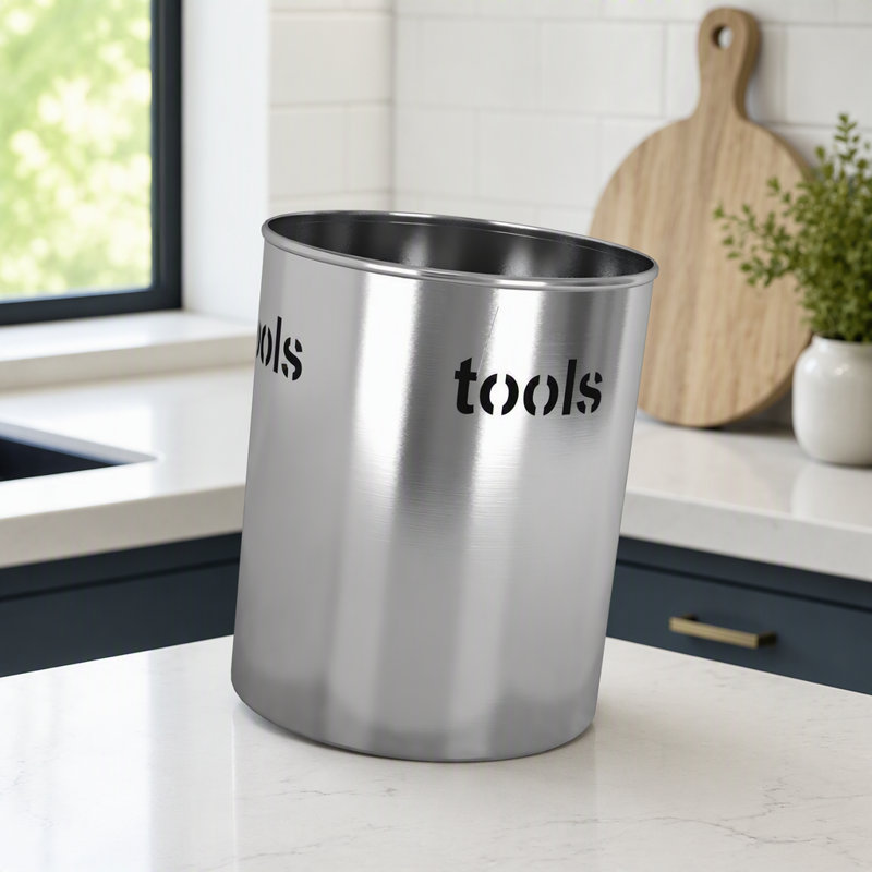 Porte-ustensiles en acier inoxydable brossé avec découpes pour outils, idéal pour les cuisines modernes. Durable et résistant à la rouille.