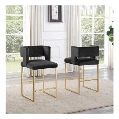 Ensemble de 2 tabourets de bar modernes et contemporains de 68,5 cm (27 pouces) de hauteur, avec revêtement en velours noir et pieds en métal doré.