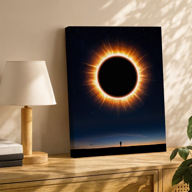 Toile, "Une scène céleste à couper le souffle" représentant une éclipse totale de soleil où l'art mural est une silhouette sombre parfaitement circulaire de la lune