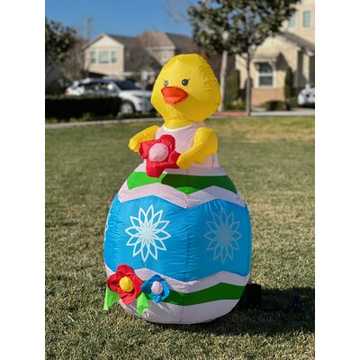 4 Foot Tall Happy Easter Lighted Inflatable Baby Chick with Red Flower Sitting Hatching Egg Indoor / Outdoor Blow Up Yard Decoration -  The Holiday AisleÂ®, 300123