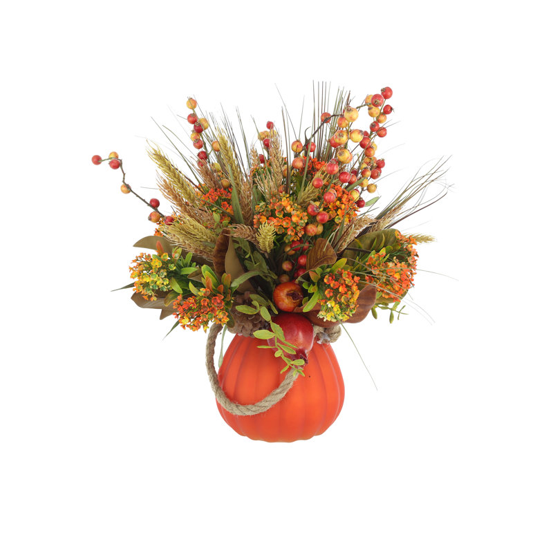 Arrangement de grenade et de blé Lohman dans un vase de citrouille en verre