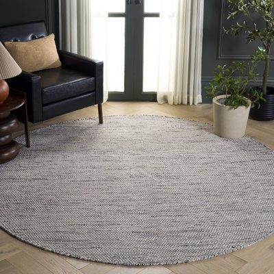 Tapis de couleur unie en laine / coton tissé à la main Tohei en ivoire / noir