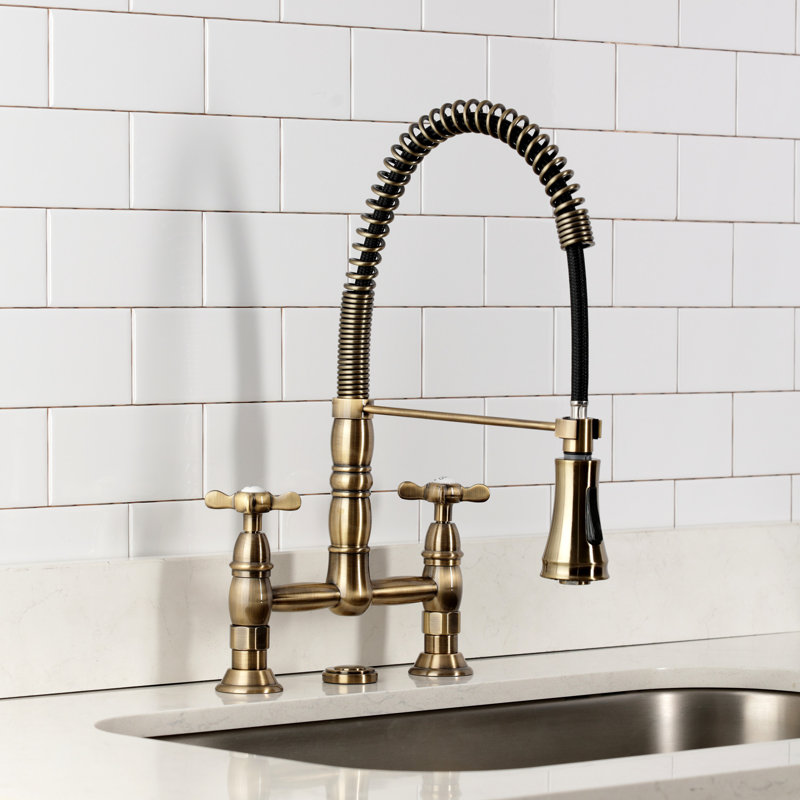 Kingston Brass Essex Double-Handle 2-Hole Deck-Mount Pre-Rinse Bridge Kitchen Faucet, Antique Brass