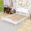 Lit plateforme en bois avec tête de lit et lattes robustes, design rétro-290808483-290808482