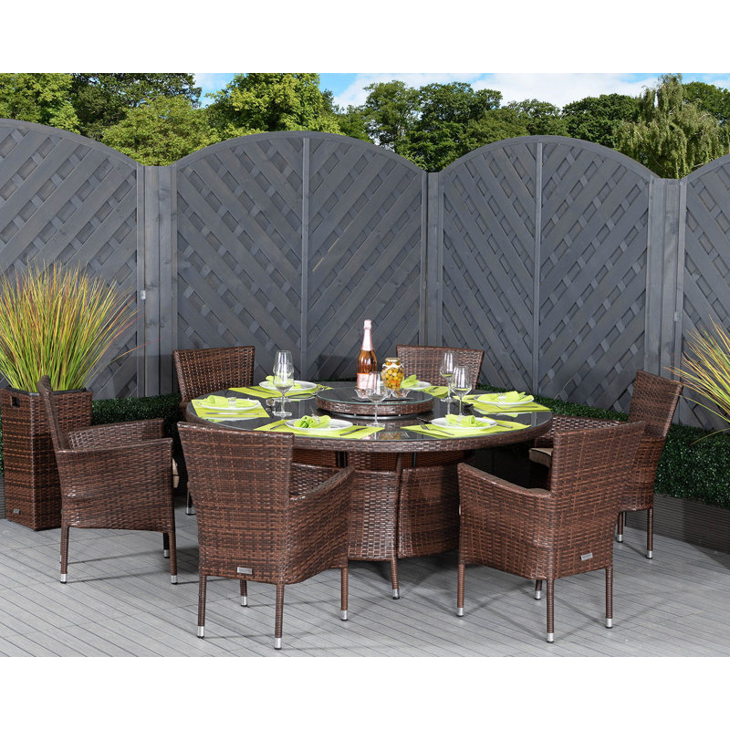 Copenhaver 6 - Person Patio Dining Set with Round Table , Cushions Included, Chocolate/Cream