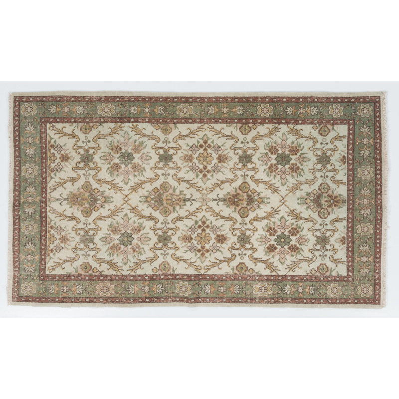 Tapis à motif floral fait à la main