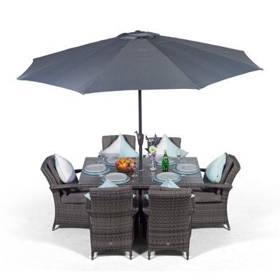 Karas 6 - Person Patio Dining Set Umbrella Hole Included Rectangular Table with Cushions Included