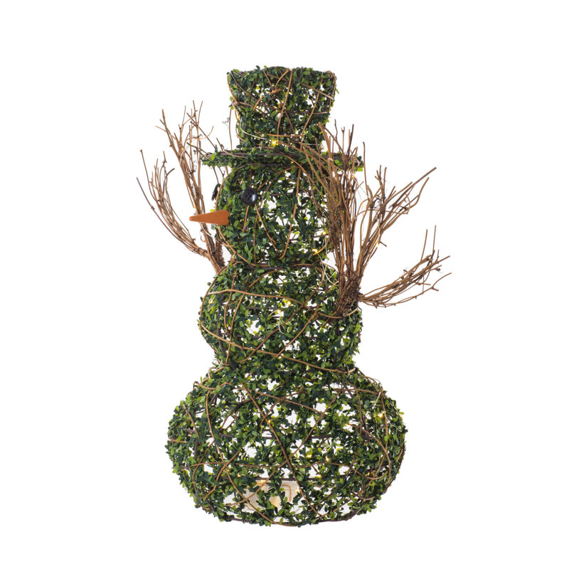 Vert / brun bonhomme de neige en buis debout avec des boutons