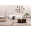 Canapé blanc rembourré 3 places blanc pour le bureau à la maison, avec un design minimaliste, des coussins confortables et une peau - Matériau dans un appartement, concept, assis, facile à assembler-133408207