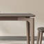 Ensemble de table de salle à manger et de chaises à panneau de pierre fine gris-109245748