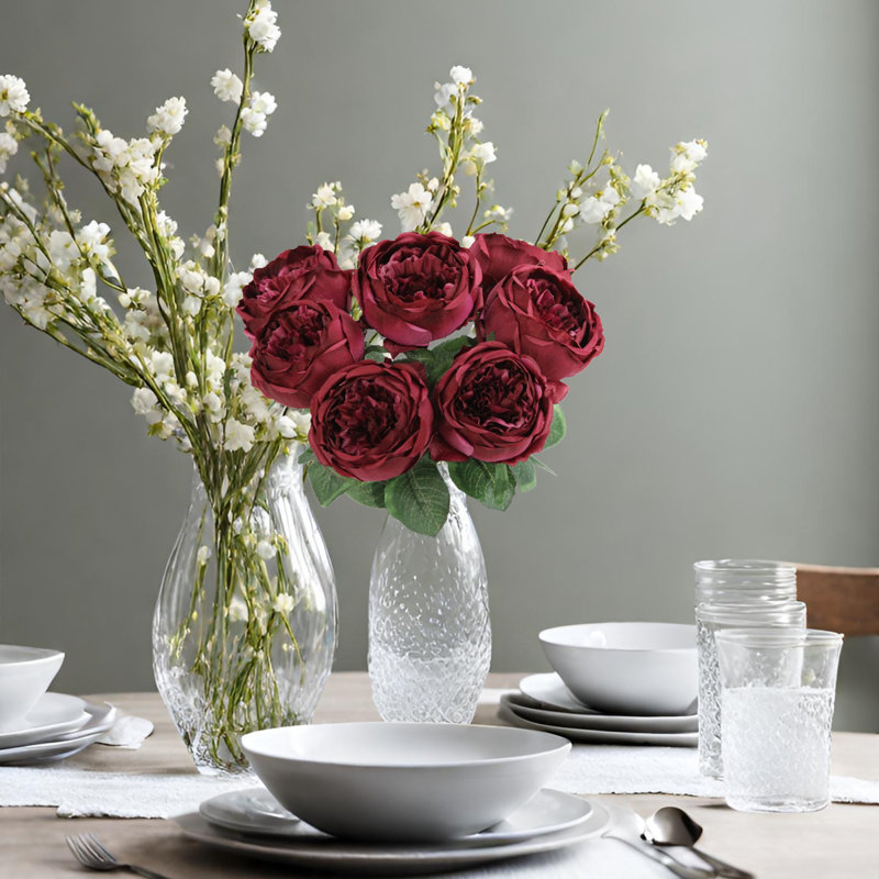 Buisson de roses en pleine floraison, Prune