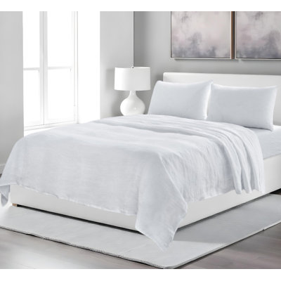 Ensemble de draps quatre pièces en lin blanc