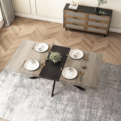 55.11'' -70.86"Retro Rectangular Stretch Dining Table, Grey Carole Top With Black Embossed Centre Plate, Black Fine Sand Cross Iron Foot Base Dining Table, With Storage Box.