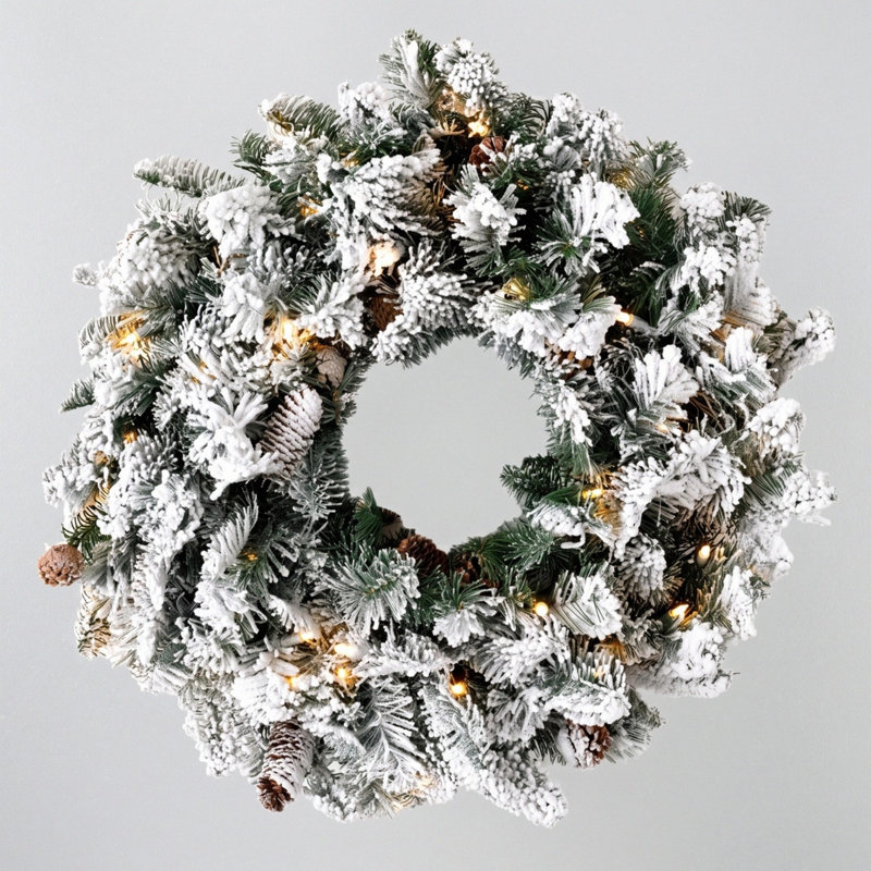 Couronne de Noël artificielle pré-éclairée 17,7 pouces avec pointes enneigées, fausses pommes de pin et lumières blanches chaudes