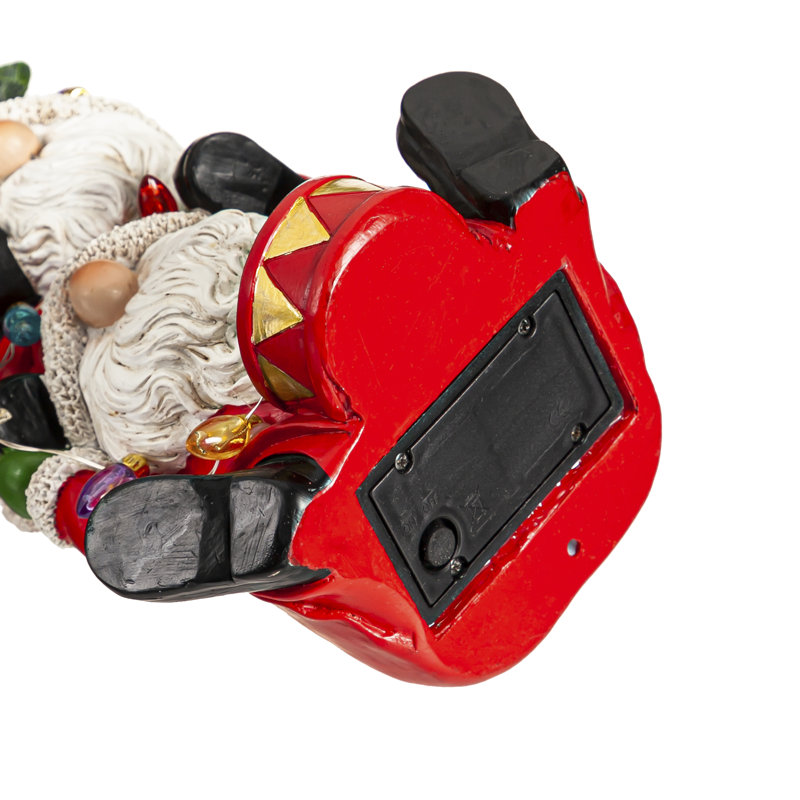 Statuaire de père Noël empilé