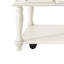 Table basse style rétro, tiroir pour télécommandes, roues verrouillables, structure en pin, plateau, pieds en bois d'hévéa blanc avec un tiroir, placage universel, design gris et blanc