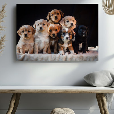 Toile dans un tableau réconfortant, sept chiots ludiques sont empilés adorablement sur une couverture crème texturée en peluche