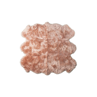 Tapis rose en peau de mouton fait à la main