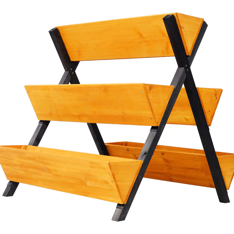 Lit surélevé en bois brun pour arbres fruitiers