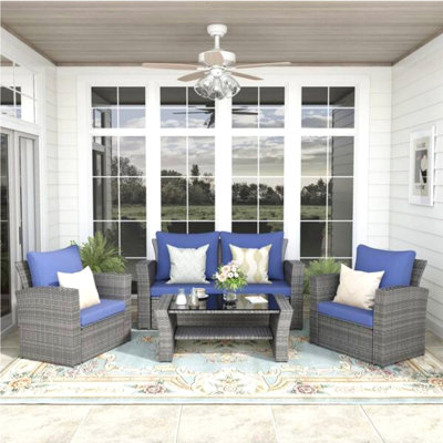4-Piece Wicker Patio Conversation Set With Glass Table And Blue Cushions