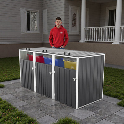 La remise à poubelle permet de ranger 3 poubelles avec une tige de support pneumatique, des portes verrouillables et une chaîne de couvercle imperméable, pour le patio, le jardin, la cour arrière