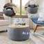 Repose-pieds rond avec rangement Dariyan-944897203