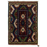 Bordjalu Wool Southwestern Area Rug in Blue/Green