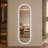65" × 18" Capsule‑Shaped Wall‑Mounted Full‑Length Mirror, Black Frame & Dimmable LED Lighting