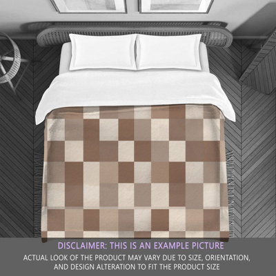 Édredon à carreaux délavé