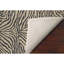 Tapis touffeté à la main à imprimé animal en polyester beige / noir-1013459179