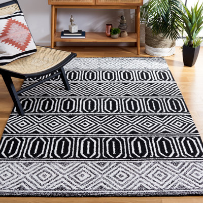 Tapis ivoire / noir Capri 702