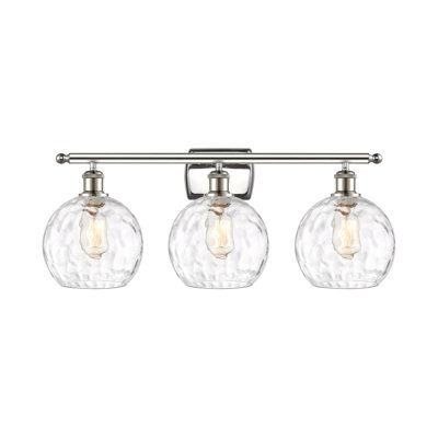 Éclairage pour meuble-lavabo en laiton antique à 3 lumières Almatine