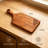 Acacia Wood Cutting Board with Handle, Paddle Serving Board for Kitchen, Charcuterie Cheese Board with Hanging Hole, Decorative Carved Wooden Board for Cooking and Serving