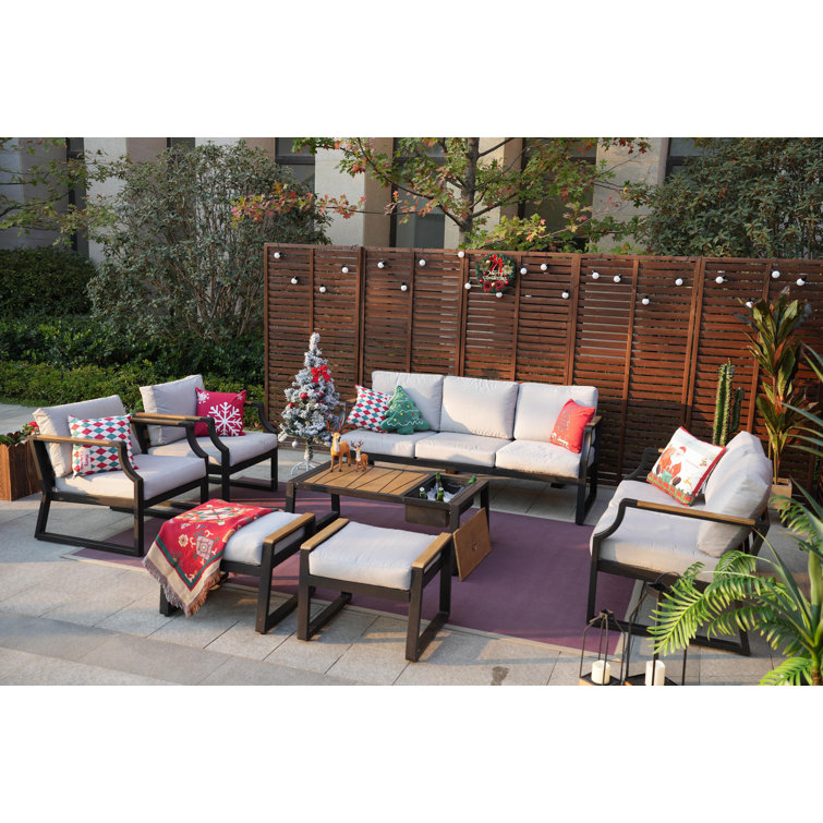 https://assets.wfcdn.com/im/69869566/resize-h755-w755%5Ecompr-r85/2270/227052715/9+-+Person+Outdoor+Seating+Group+with+Cushions.jpg