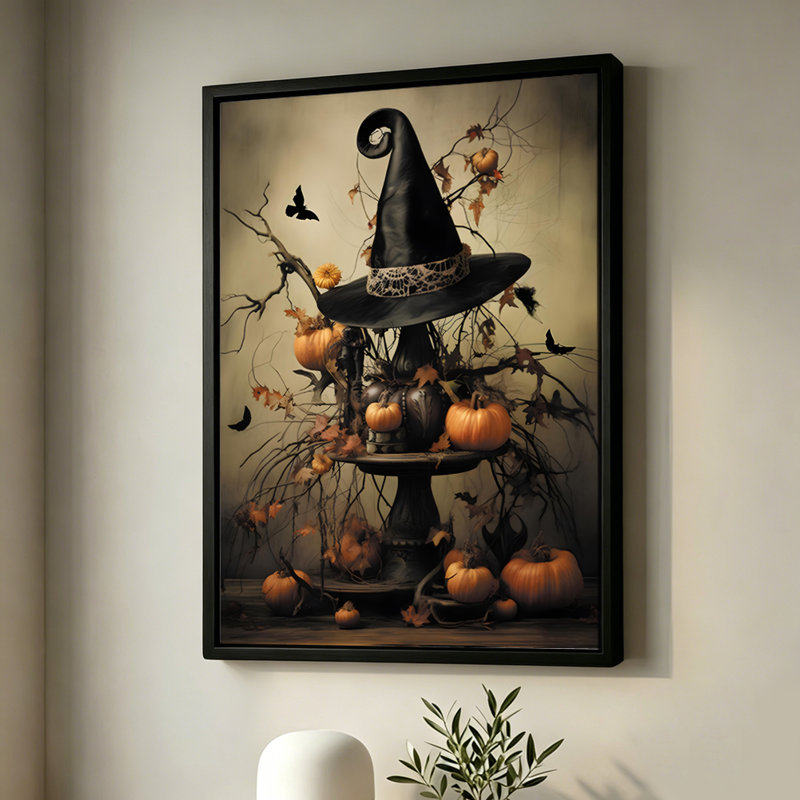 Chapeau de sorcière d'Halloween sur un présentoir à étages avec citrouilles, tableau sur toile encadré, cadre beige, 50 x 75 cm