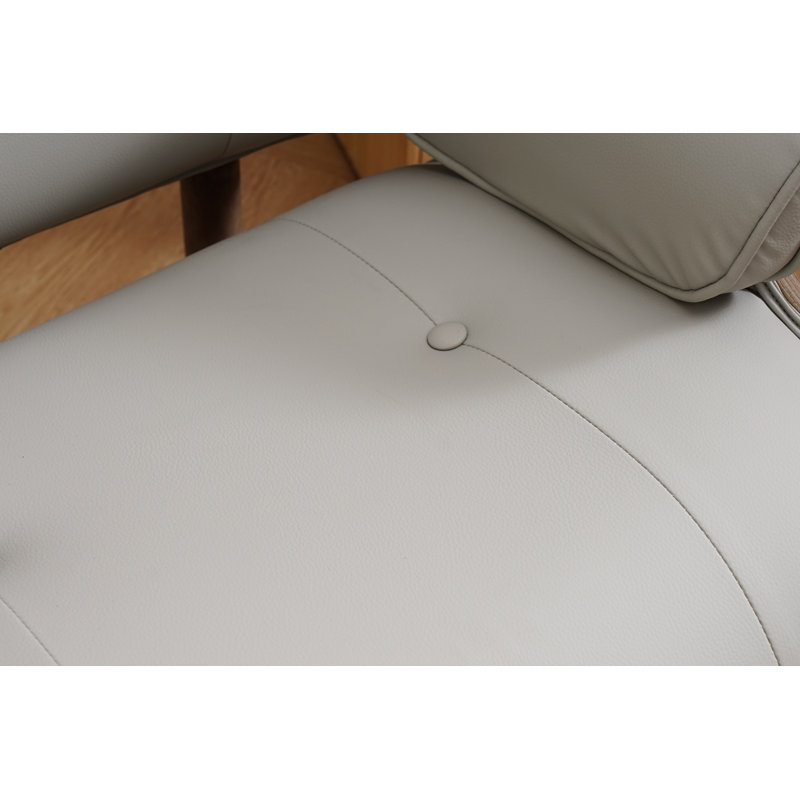 Fauteuil à oreilles capitonné Jhanae, Similicuir gris