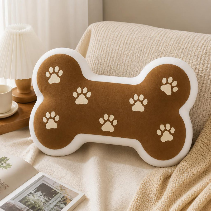 Coussin décoratif en forme d'os avec empreinte de patte marron et crème, imprimé plat en 2D. Parfait pour le divan, la chambre à coucher, le salon, le bureau et la voiture. Cadeau idéal. Dimensions : 25 cm (9,8 pouces).