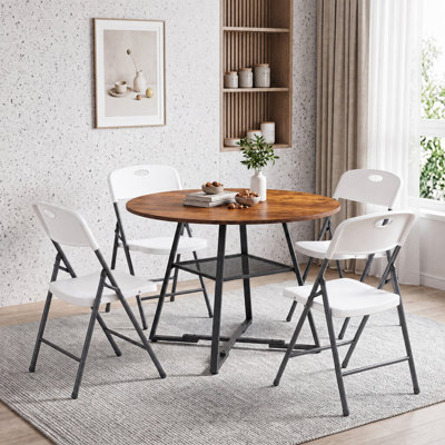 Space-Saving Dining Room Set With Foldable Upholstered Chairs And Round Dining Table