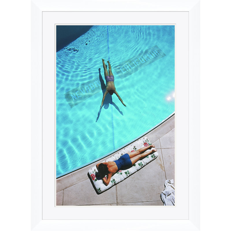 Swimmer And Sun Bather Print by Slim Aarons, 48.5" H x 32.5" W x 0.1" D, Unframed