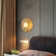 This Unique LED Wall Sconce Is In A Brass Finish. The Frame Is Made Out Of Stainless Steel, And The LED Bulb Is Integrated Into The Frame. It Also Comes With An Opal White Glass Shade. It Can Be Used In Any Rooms, Entryway, And More.